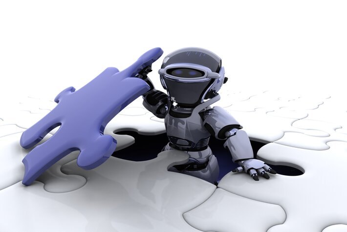 An illustration of a small robot holding a puzzle piece