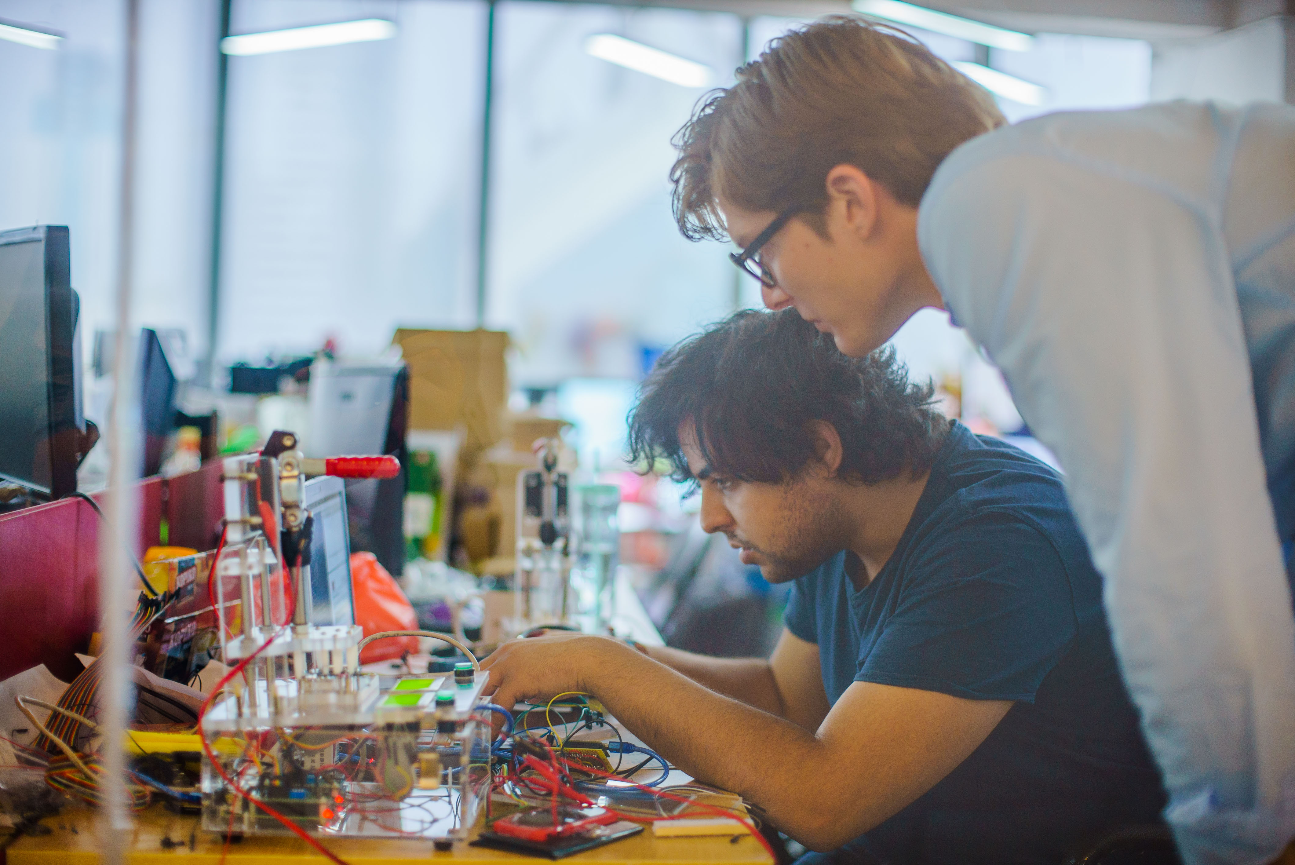 Product development team reviewing engineering work